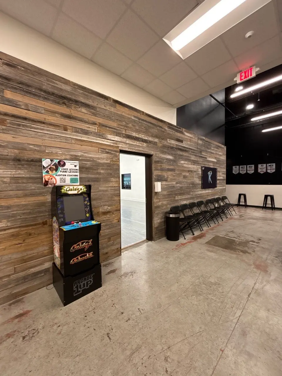 Reclaimed wood feature wall at the entry to the athletic facility